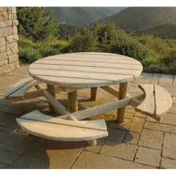 Table pique-nique ronde en bois sur une terrasse